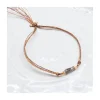 BIANCA - BRACELET PEACH MOONSTONES ET COLOR CHANGE GARNETS SUR FIL LUREX