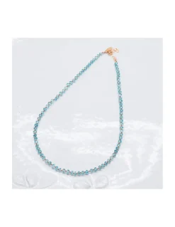 GIGI - COLLIER ZIRCONS NATURELS BLEUS NOUES SUR FIL WOOD