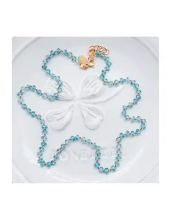 GIGI - COLLIER ZIRCONS NATURELS BLEUS NOUES SUR FIL WOOD