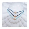 GRANNY - BRACELET CROIX ZIRCONS SUR CORDON AU CHOIX (TONS BLEUS)