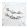 GRAZIA - BRACELET 3 AQUAKYANITES OVALES & 8 MORGANITES / AQUAMARINES SUR CORDON