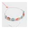 GRAZIA - BRACELET AQUAKYANITES OVALES, TOURMALINES, MORGANITES ET AQUAMARINES SUR CORDON
