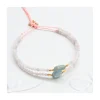 GRAZIA - BRACELET AQUAKYANITES OVALES & 25 MORGANITES / AQUAMARINES SUR CORDON