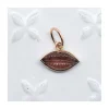 JOHRI - PENDENTIF BOUCHE EN OR ET TOURMALINE ROSE FUMÉE