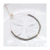 LA MESA DRIVE - BRACELET PYRITES ET PERLE DORÉE AU CENTRE