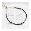 LA MESA DRIVE - BRACELET SIPNELLES NOIRES ET PERLE DORÉE AU CENTRE