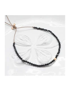 LA MESA DRIVE - BRACELET SIPNELLES NOIRES ET PERLE DORÉE AU CENTRE