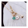 MÉDAILLES RONDE NACRE ET ZIRCON, TREFLE VERT ET ÉPINGLE (30€ à 48€)