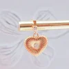 SCANDALE - BOUCLE D'OREILLE PUCE CZ ET CHARM COEUR AVEC ZIRCON CENTRAL